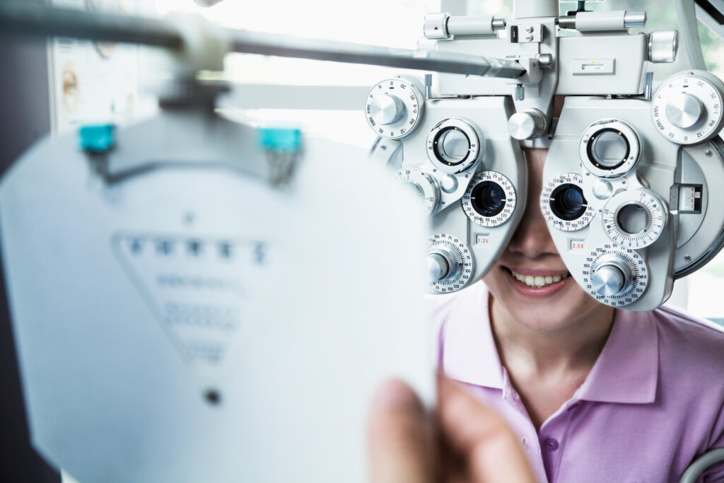 Image of a person getting an eye exam for prescription contact lenses